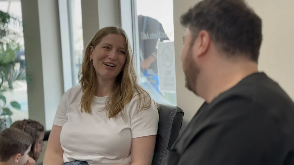 A patient talking with her dentist