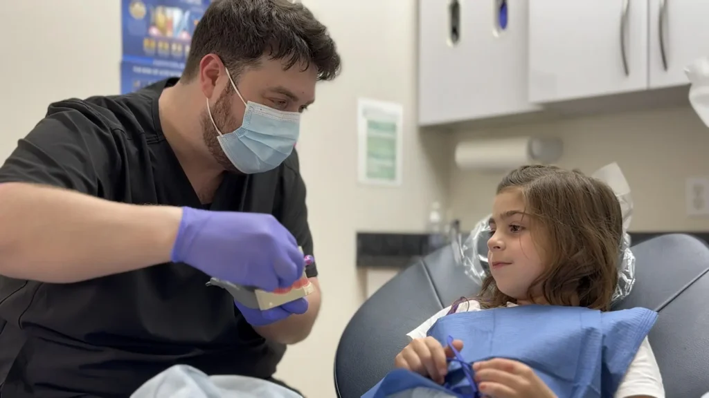 A young patient being seen at KWC Dental